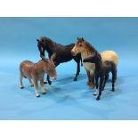 Four Beswick horses