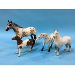 Four Beswick dappled horses/ponies