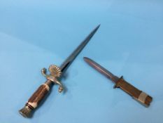 A German hunting knife, stamped Solingen Whitby, and a German Paratroopers style knife