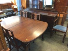 A mahogany dining room suite, comprising table, six chairs (4+2) and a sideboard