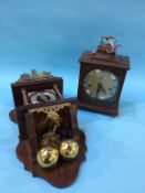 A Dutch wall clock and a mantle clock