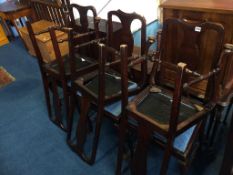 Six mahogany dining chairs