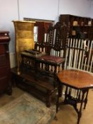 A coffee table, occasional table, two chairs and a gold chest of drawers