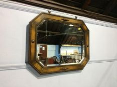 An oak framed mirror