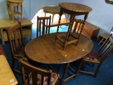 An oak barley twist gateleg table, chairs and an occasional table