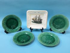 A Sunderland lustre plaque, and four Majolica plates