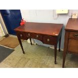 An Edwardian mahogany side table