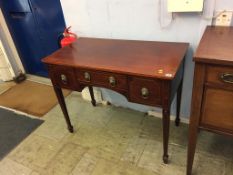 An Edwardian mahogany side table