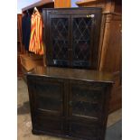 An oak Old Charm style corner cabinet and bookcase