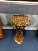 A gilded 'Rose' table with glass top