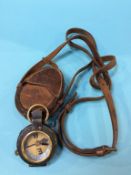 An officer's compass with leather case