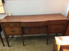 An Edwardian mahogany sideboard