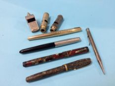 Various pens and whistles