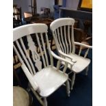 Two painted slat back armchairs