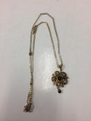 A 9ct gold pendant, mounted with seed pearls and diamonds etc. 6g