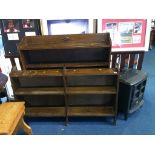 Two oak bookcases and an electric fire