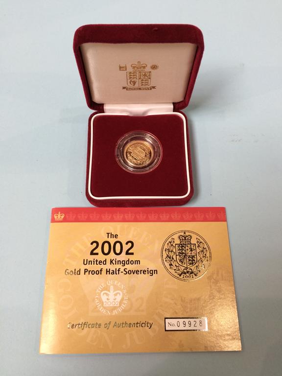 A boxed 2002 half proof sovereign