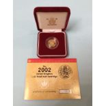 A boxed 2002 half proof sovereign