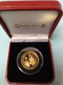A Queen Elizabeth II Crown Jewel Collection, half Crown gold coin, weight 15.55g