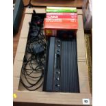 An Atari CX 2600 and games