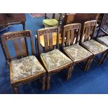 Four oak chairs