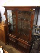 An Old Charm oak display cabinet