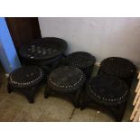 A reclaimed tyre circular table and five stools