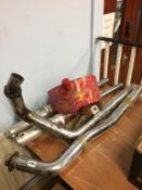 Harley Davidson exhaust pipes, forks and oil tank