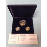 A 1998 Guernsey coin set, to include a 24ct gold £25 coin, weight 7.81g, a £1 sterling silver coin