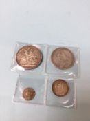 Four British coins, crowns etc.