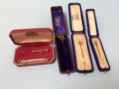 Gold pins and a plated propelling pencil etc.