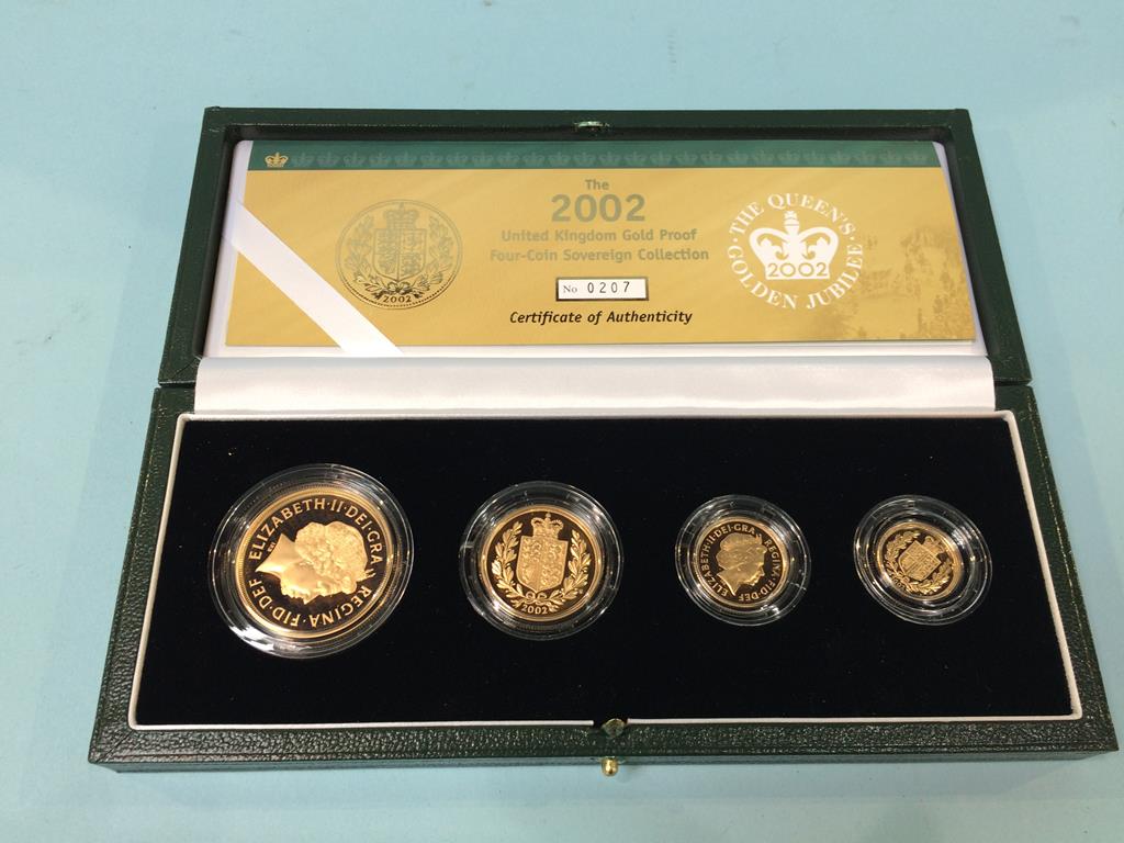 A United Kingdom 2002 Gold Proof Sovereign Collection, to include half sovereign, full sovereign,
