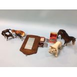 A collection of small Beswick horses, table lighters etc.