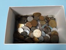 A small box of Great Britain, European and International coinage and tokens