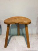 A Robert Mouseman of Kilburn oak three legged stool