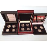 Two boxed Maundy money sets, and The Three Faces of Victoria silver threepence set