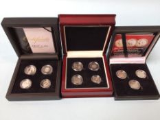 Two boxed Maundy money sets, and The Three Faces of Victoria silver threepence set