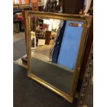 A large gilt framed mirror, 130cm x 105cm