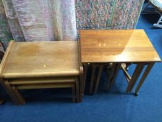 Two teak nests of tables