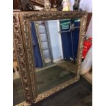 A large silver framed mirror, 133cm x 102cm