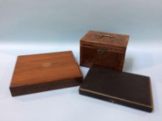 A burr walnut and crossbanded tea caddy, a cased set of 12 dessert knives and forks and a cased