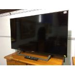 A Sony TV, with remote