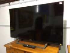 A Sony TV, with remote