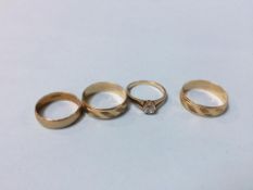 Four 9ct gold rings, 9g