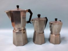 Three graduating Moka Express coffee percolators