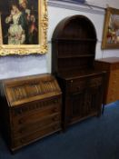 An oak linenfold bureau, and an oak dresser