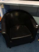 A black tub chair