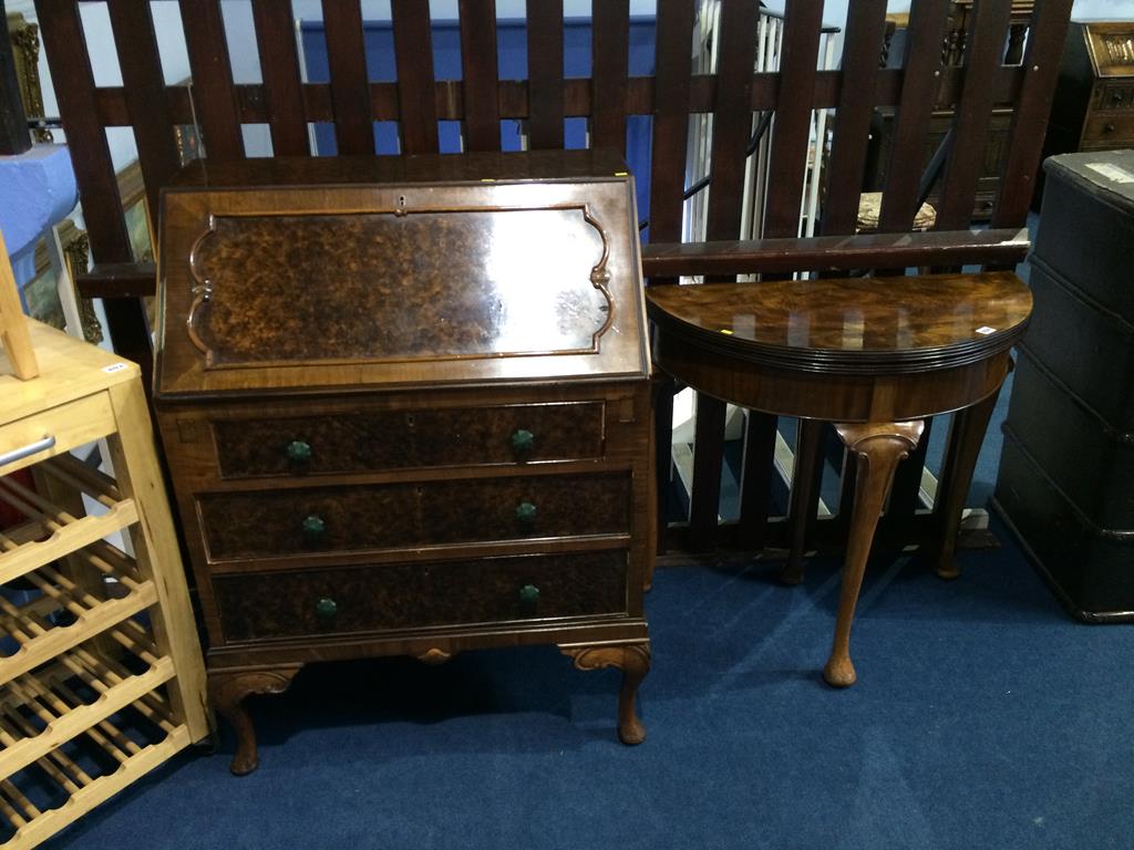 A burr walnut bureau and a burr walnut half moon card table