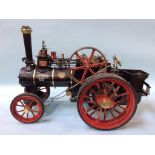 A near complete live steam traction engine, width 34cm, length 68cm