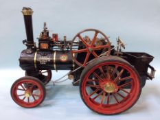 A near complete live steam traction engine, width 34cm, length 68cm